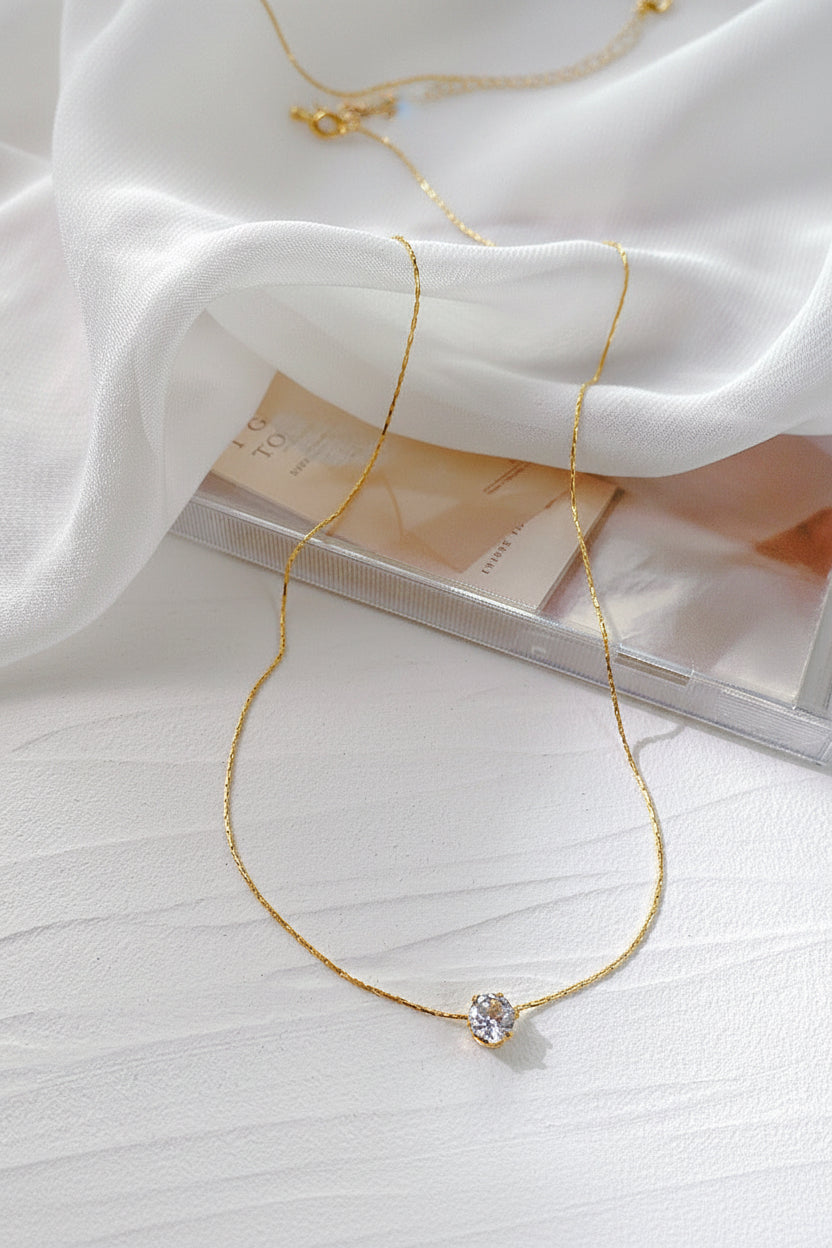 Single Diamond Pendant Necklace